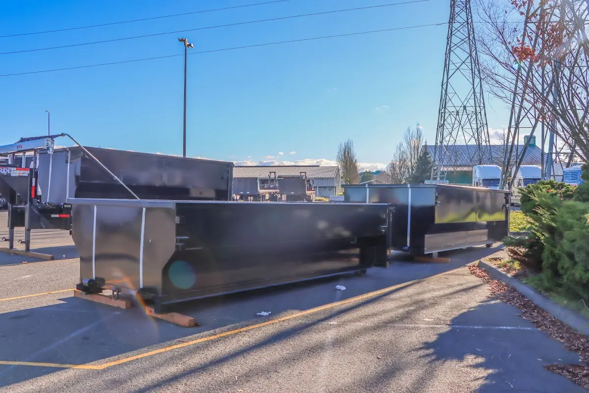 Roll-off dumpster ready for waste disposal at job site for 6 Yard Dumpster Rental in Malden